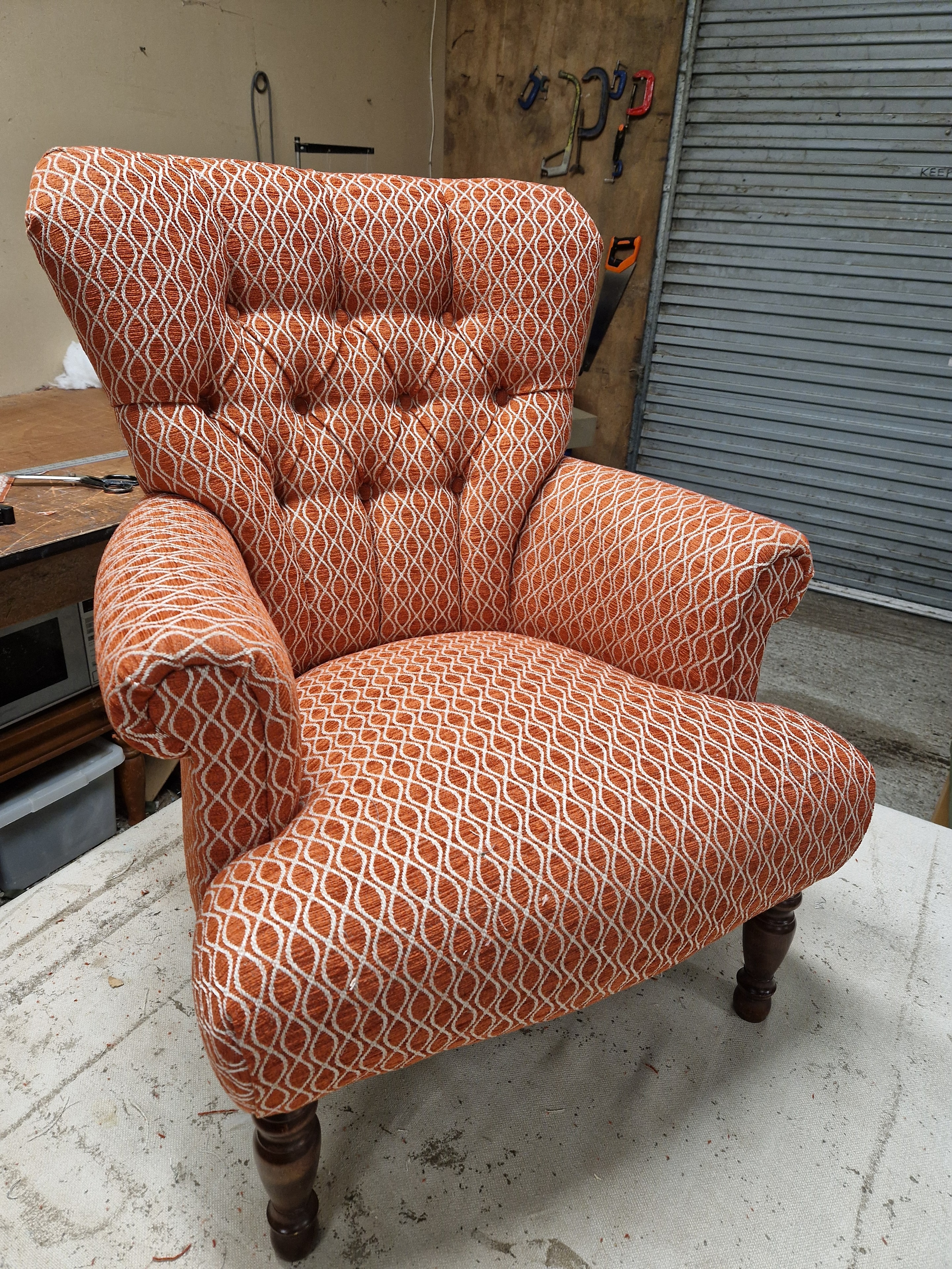 Orange patterned armchair